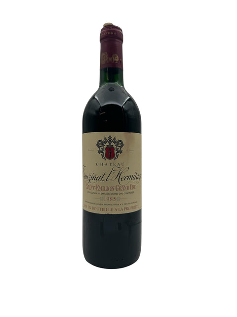 Flaske af Tauzinat l'Hermitage Château 1985 rødvin