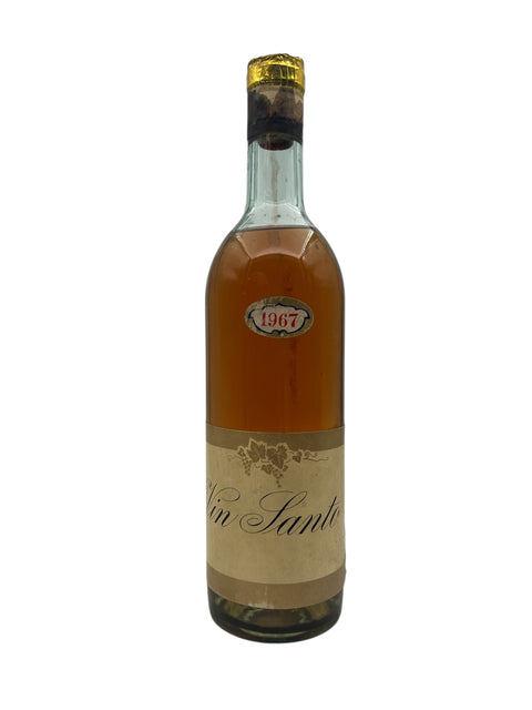 Flaske af Vin Santo 1967 med gylden farve og elegant etiket
