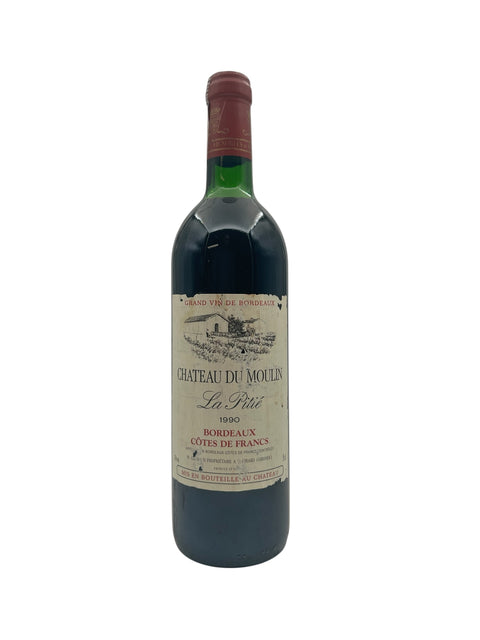 Flaske af La Pitié Chateau du Moulin 1990 rødvin