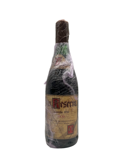 Flaske af Gran Reserva Berberana 1950 pakket ind i folie