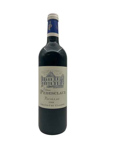 Bottle of Château Pedesclaux 2008 red wine from Pauillac with label