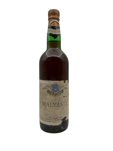 Bottle of Malvasia wine from 1968 with aged label
