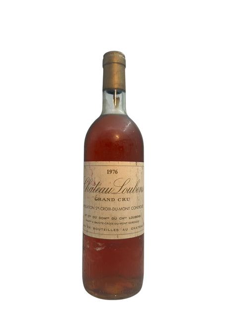 Flaska Château Loudenne dessertvin 1976 med gyllene färg