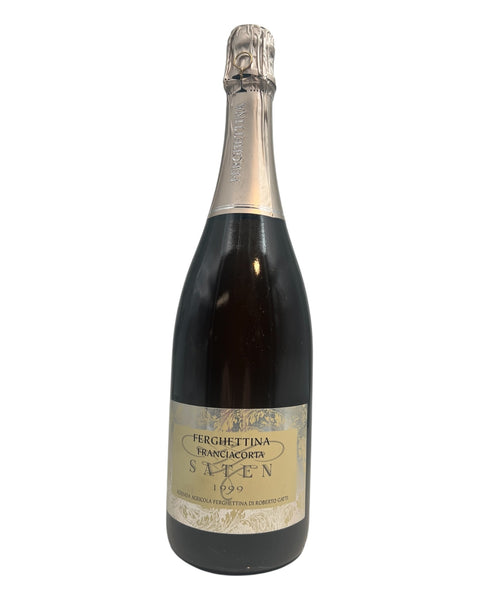 Fles Franciacorta Ferghettina mousserende wijn uit 1999 met elegant etiket