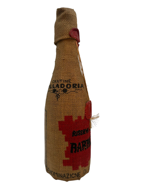 Bottle of Barbaresco Cantina Villadoria 1975 wrapped in jute bag